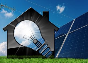 3D illustration of a model house with a light bulb, solar panels and a power line on a blue sky with clouds - Renewable resources concept